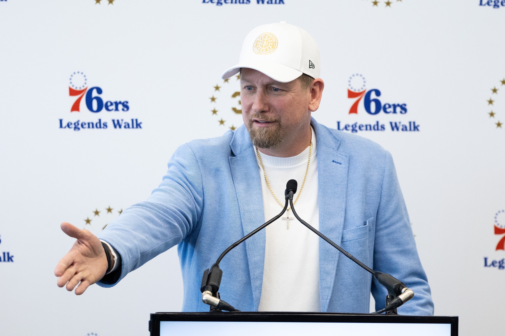 Apr 12, 2024; Camden, NJ, USA; Philadelphia 76ers head coach Nick Nurse speaks at the podium during the presentation of a statue honoring Allen Iverson (not pictured) in a ceremony at Penn Medicine Philadelphia 76ers Training Complex. Mandatory Credit: Bill Streicher-USA TODAY Sports
