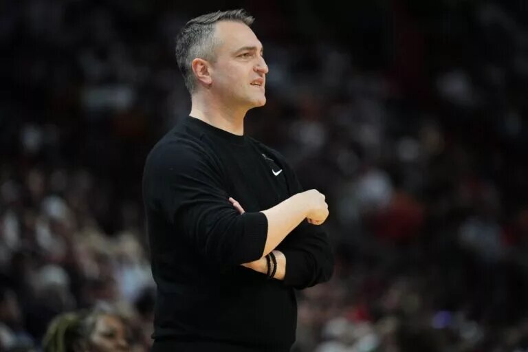 Apr 12, 2024; Miami, Florida, USA; Toronto Raptors head coach Darko Rajakovic, center, directs his team during the second half against the Miami Heat at Kaseya Center. Mandatory Credit: Jim Rassol-USA TODAY Sports