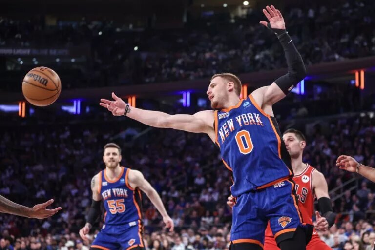 Apr 14, 2024; New York, New York, USA; New York Knicks guard Donte DiVincenzo (0) tries to hold onto the ball in the second quarter against the Chicago Bulls at Madison Square Garden. Mandatory Credit: Wendell Cruz-USA TODAY Sports