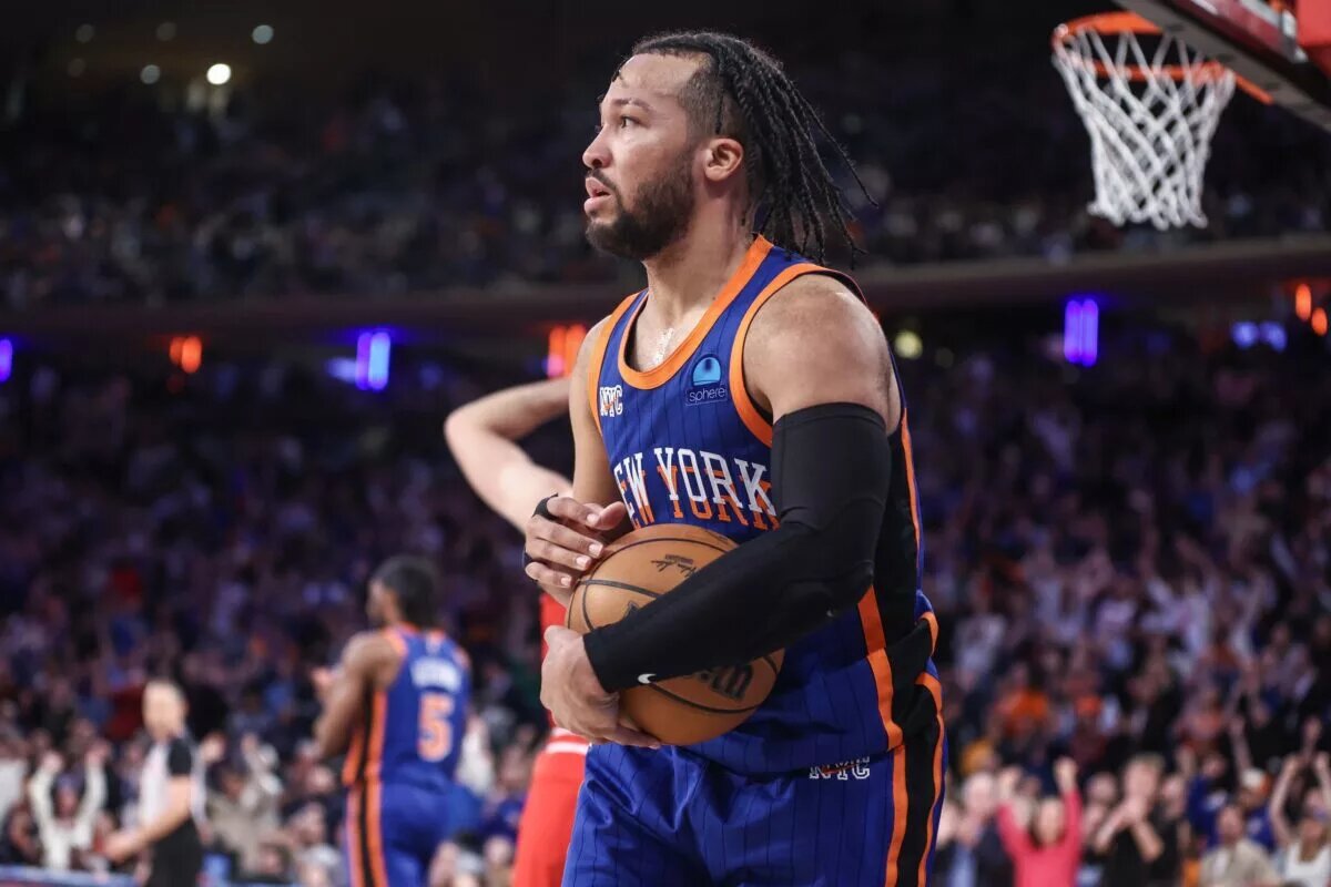Apr 14, 2024; New York, New York, USA; New York Knicks guard Jalen Brunson (11) holds onto the ball after grabbing a rebound in overtime against the Chicago Bulls at Madison Square Garden. Mandatory Credit: Wendell Cruz-USA TODAY Sports