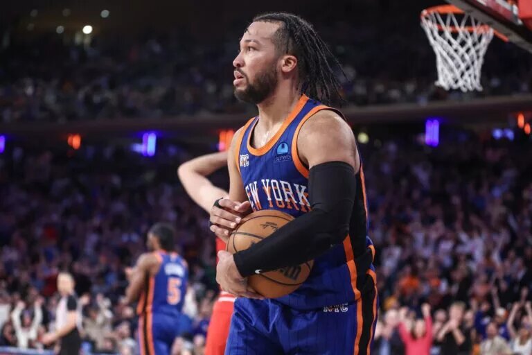 Apr 14, 2024; New York, New York, USA; New York Knicks guard Jalen Brunson (11) holds onto the ball after grabbing a rebound in overtime against the Chicago Bulls at Madison Square Garden. Mandatory Credit: Wendell Cruz-USA TODAY Sports