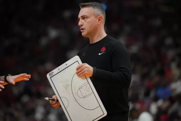 Apr 14, 2024; Miami, Florida, USA; Toronto Raptors head coach Darko Rajakovic prepares for a timeout during the first half against the Miami Heat at Kaseya Center. Mandatory Credit: Jim Rassol-USA TODAY Sports