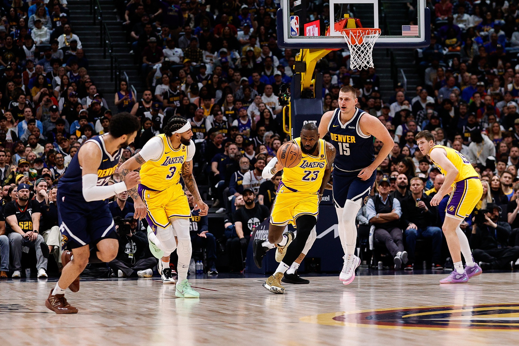 Los Angeles Lakers stars LeBron James and Anthony Davis lead a fast break