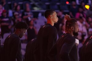 Oct 13, 2023; San Antonio, Texas, USA; San Antonio Spurs center Victor Wembanyama (1) stands for the national anthem before a game against the Miami Heat at Frost Bank Center. Mandatory Credit: Scott Wachter-USA TODAY Sports