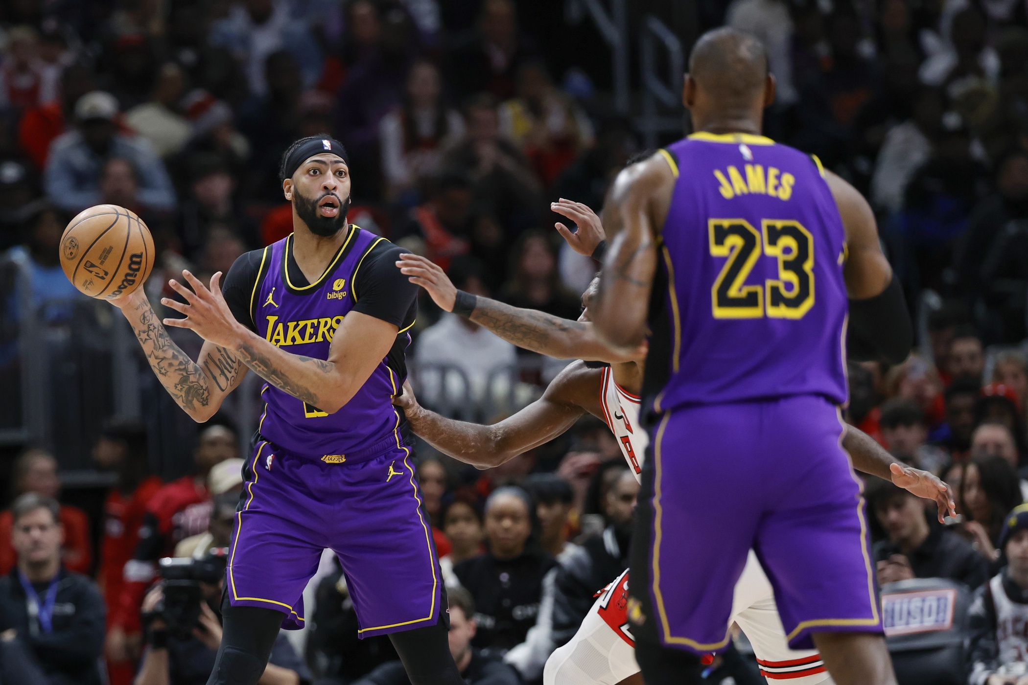 Dec 20, 2023; Chicago, Illinois, USA; Los Angeles Lakers forward Anthony Davis (3) looks to pass the ball against the Chicago Bulls during the first half at United Center. Mandatory Credit: Kamil Krzaczynski-USA TODAY Sports