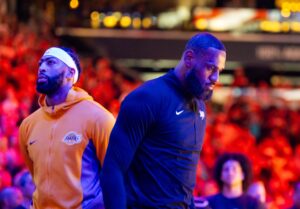 Feb 25, 2024; Phoenix, Arizona, USA; Los Angeles Lakers forward LeBron James (right) and Anthony Davis against the Phoenix Suns at Footprint Center. Mandatory Credit: Mark J. Rebilas-USA TODAY Sports