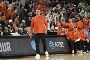 Mar 23, 2024; Omaha, NE, USA; Illinois Fighting Illini head coach Brad Underwood looks on against the Duquesne Dukes during the first half in the second round of the 2024 NCAA Tournament at CHI Health Center Omaha. Mandatory Credit: Steven Branscombe-USA TODAY Sports