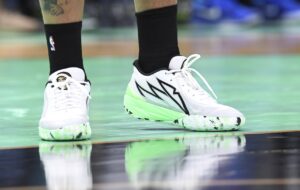 Apr 9, 2024; Charlotte, North Carolina, USA; A detailed look at the shoes of Charlotte Hornets forward Miles Bridges (0) during the second half against the Dallas Mavericks at the Spectrum Center. Mandatory Credit: Sam Sharpe-USA TODAY Sports