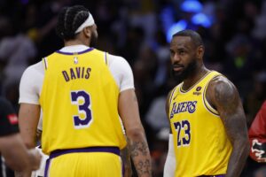 Apr 3, 2024; Washington, District of Columbia, USA; Los Angeles Lakers forward LeBron James (23) talks with Lakers forward Anthony Davis (3) against the Washington Wizards at Capital One Arena. Mandatory Credit: Geoff Burke-USA TODAY Sports