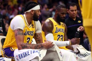 Los Angeles Lakers forward Anthony Davis (3) and forward LeBron James (23) sit on the bench during a time out during the second half against the Memphis Grizzlies at FedExForum