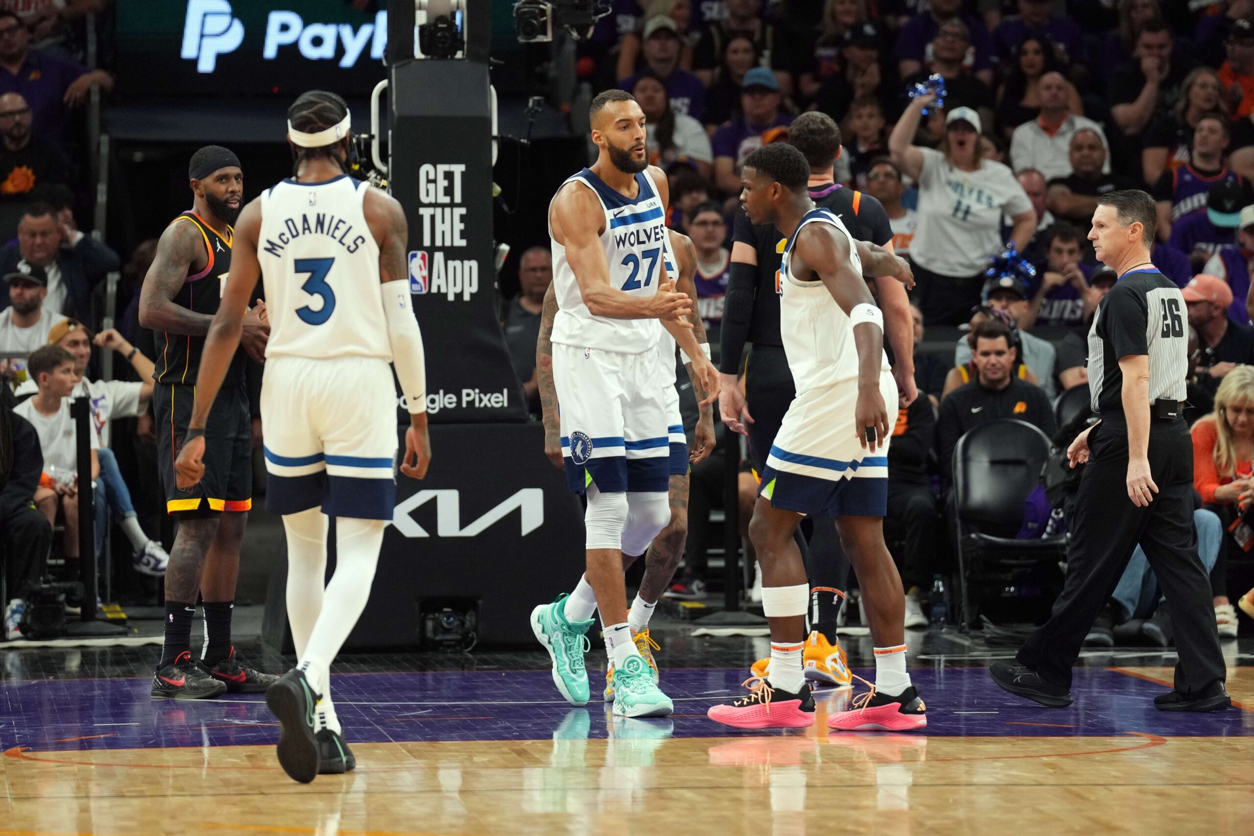Minnesota Timberwolves center Rudy Gobert (27) celebrates with teammates against the Phoenix Suns during the first half of game four of the first round for the 2024 NBA playoffs at Footprint Center.