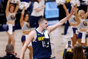 Denver Nuggets center Nikola Jokic (15) waves after the game against the Los Angeles Lakers in game five of the first round for the 2024 NBA playoffs at Ball Arena.