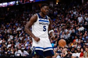 Minnesota Timberwolves guard Anthony Edwards (5) reacts after a play in the second quarter against the Denver Nuggets during game two of the second round for the 2024 NBA playoffs at Ball Arena.