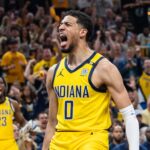 May 12, 2024; Indianapolis, Indiana, USA; Indiana Pacers guard Tyrese Haliburton (0) celebrates a made basket during game four of the second round for the 2024 NBA playoffs against the New York Knicks at Gainbridge Fieldhouse. Mandatory Credit: Trevor Ruszkowski-USA TODAY Sports