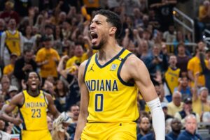 May 12, 2024; Indianapolis, Indiana, USA; Indiana Pacers guard Tyrese Haliburton (0) celebrates a made basket during game four of the second round for the 2024 NBA playoffs against the New York Knicks at Gainbridge Fieldhouse. Mandatory Credit: Trevor Ruszkowski-USA TODAY Sports