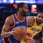 May 14, 2024; New York, New York, USA; New York Knicks guard Alec Burks (18) dribbles against Indiana Pacers forward Obi Toppin (1) during the second half during game five of the second round for the 2024 NBA playoffs at Madison Square Garden. Mandatory Credit: Vincent Carchietta-USA TODAY Sports