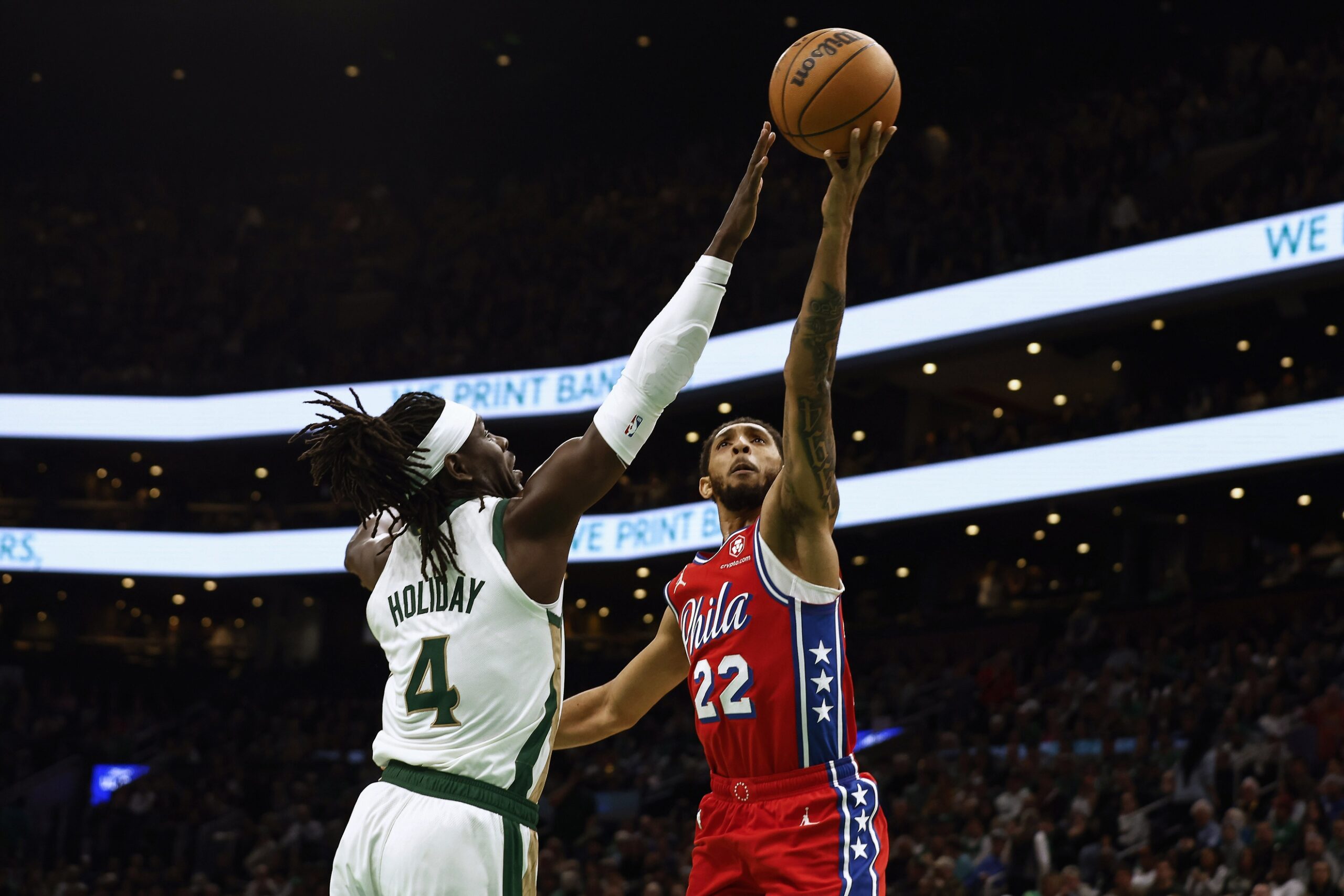 Boston Celtics guard Jrue Holiday blocks Philadelphia 76ers guard Cam Payne