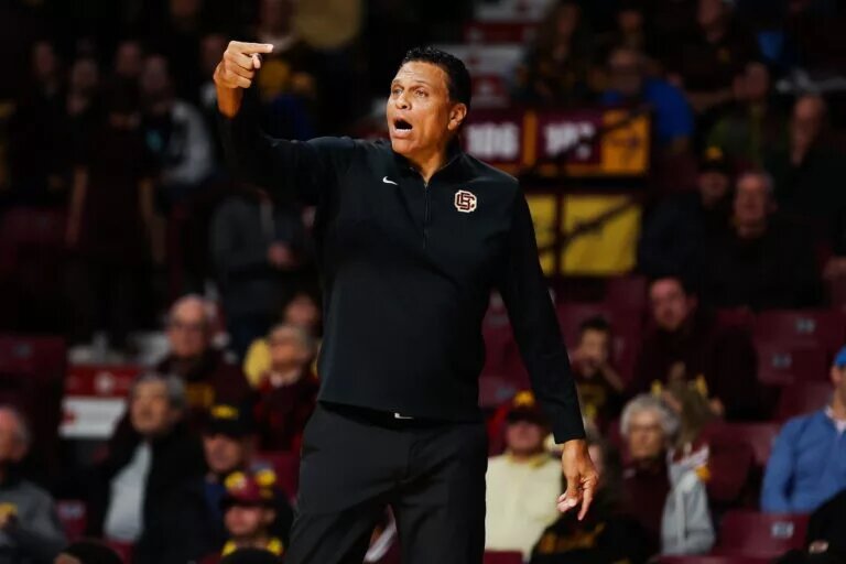 Bethune-Cookman head coach Reggie Theus, Los Angeles Lakers fan