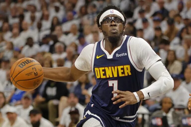 Reggie Jackson, traded by Denver Nuggets
