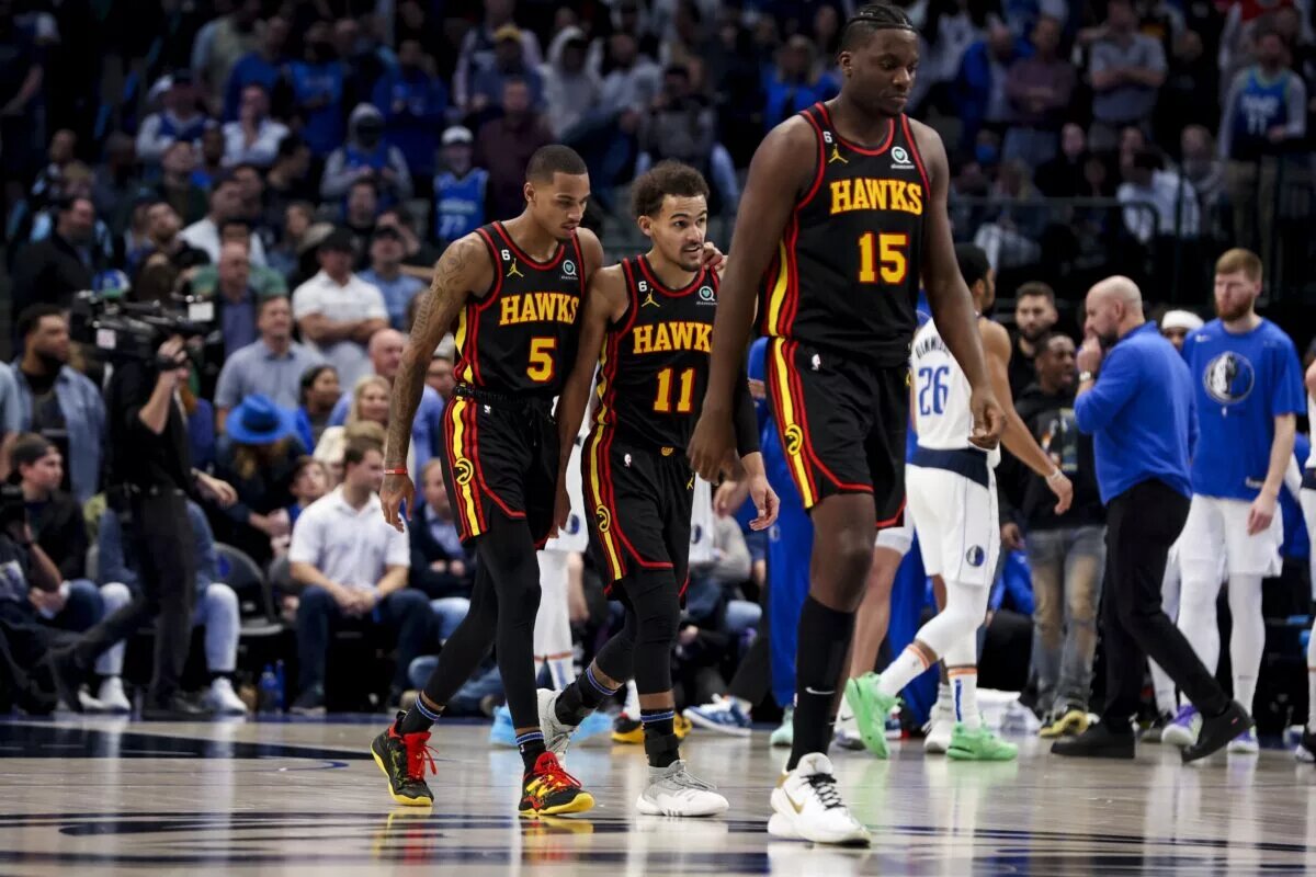 Atlanta Hawks players Trae Young, Dejounte Murray, and Clint Capela