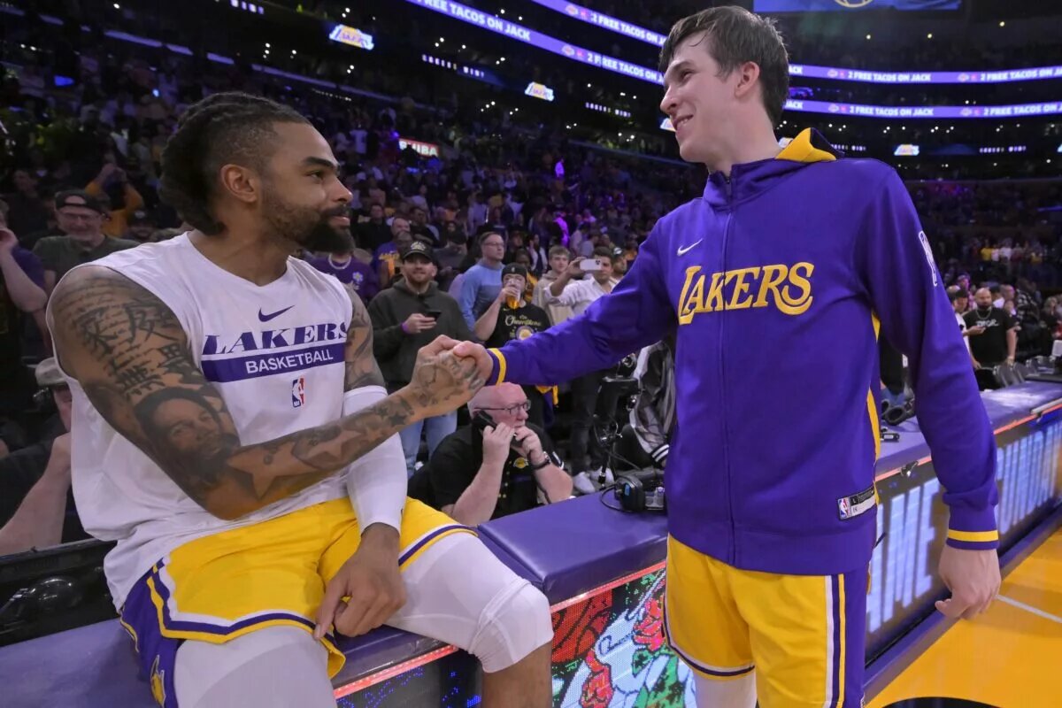 May 12, 2023; Los Angeles, California, USA; Los Angeles Lakers guard D'Angelo Russell (1) and guard Austin Reaves (15) celebrate after winning game six of the 2023 NBA playoffs against the Golden State Warriors at Crypto.com Arena. Mandatory Credit: Jayne Kamin-Oncea-USA TODAY Sports