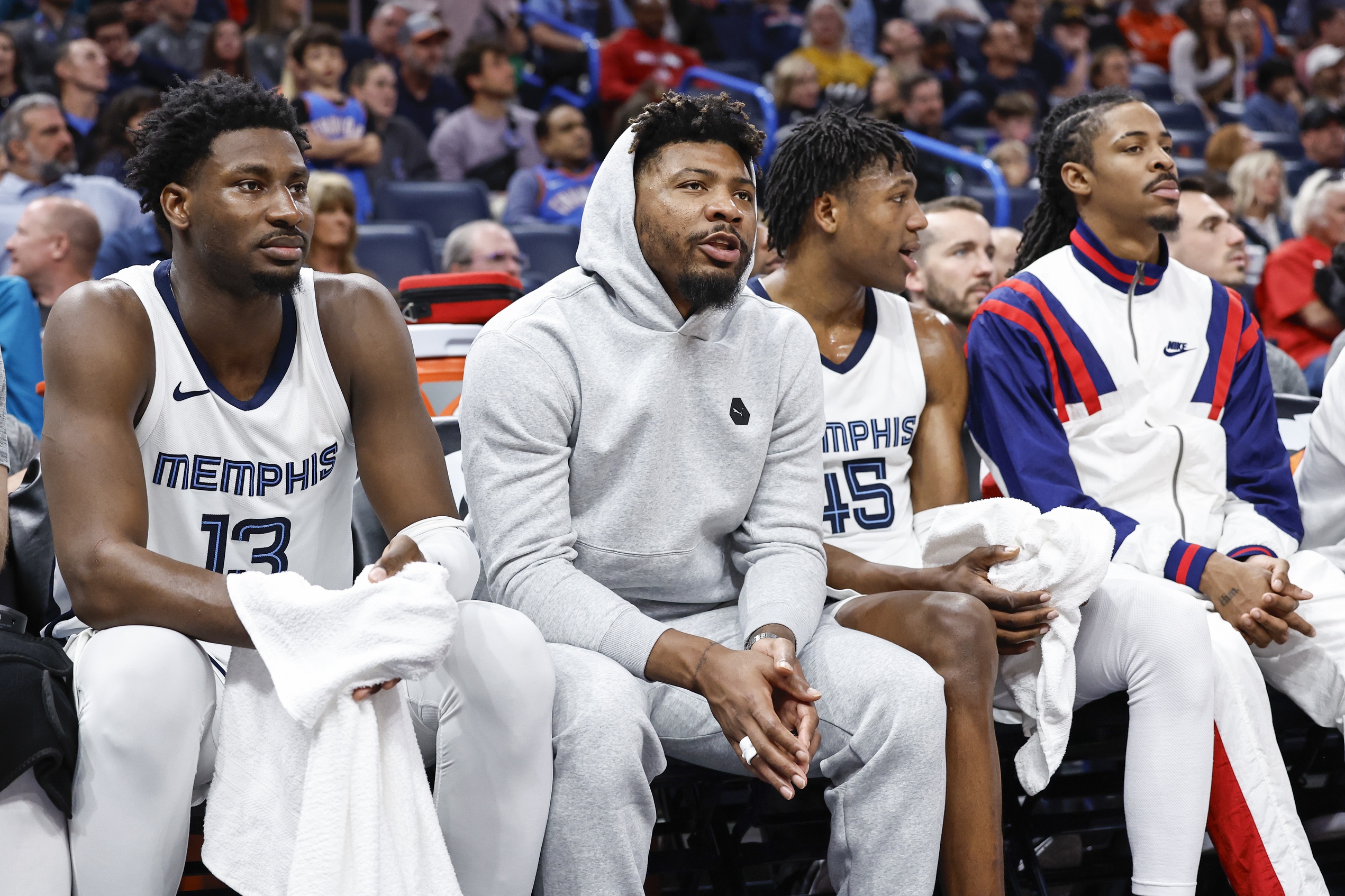 Mar 10, 2024; Oklahoma City, Oklahoma, USA; Memphis Grizzlies forward Jaren Jackson Jr. (13), guard Marcus Smart (36), forward GG Jackson (45) and guard Ja Morant (12) watch their team play against the Oklahoma City Thunder from the bench during the second half at Paycom Center. Mandatory Credit: Alonzo Adams-USA TODAY Sports