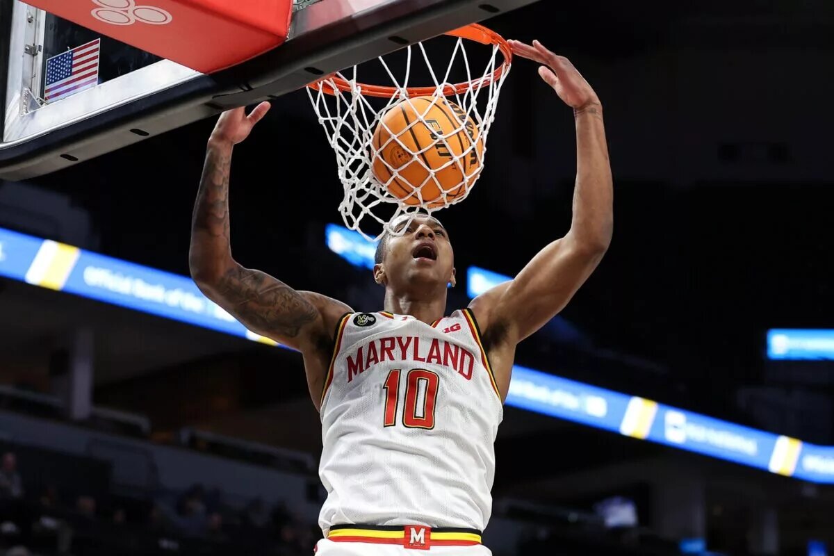 Mar 13, 2024; Minneapolis, MN, USA; Maryland Terrapins forward Julian Reese (10) dunks against the Rutgers Scarlet Knights during the second half at Target Center. Mandatory Credit: Matt Krohn-USA TODAY Sports