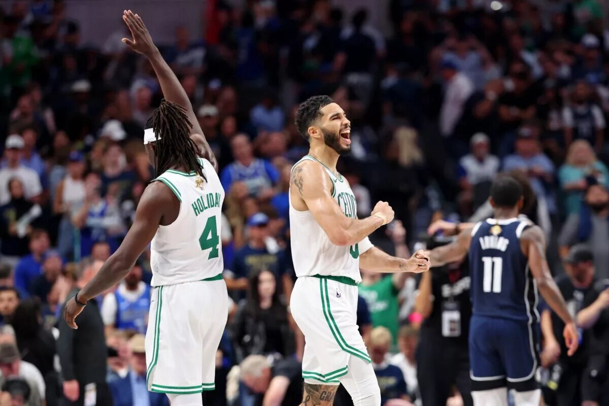 Jun 12, 2024; Dallas, Texas, USA; Boston Celtics guard Jrue Holiday (4) and forward Jayson Tatum (0) celebrates after their win against the Dallas Mavericks in game three of the 2024 NBA Finals at American Airlines Center. Mandatory Credit: Kevin Jairaj-USA TODAY Sports
