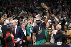 Boston Celtics star Jaylen Brown hoists 2024 NBA Finals MVP trophy