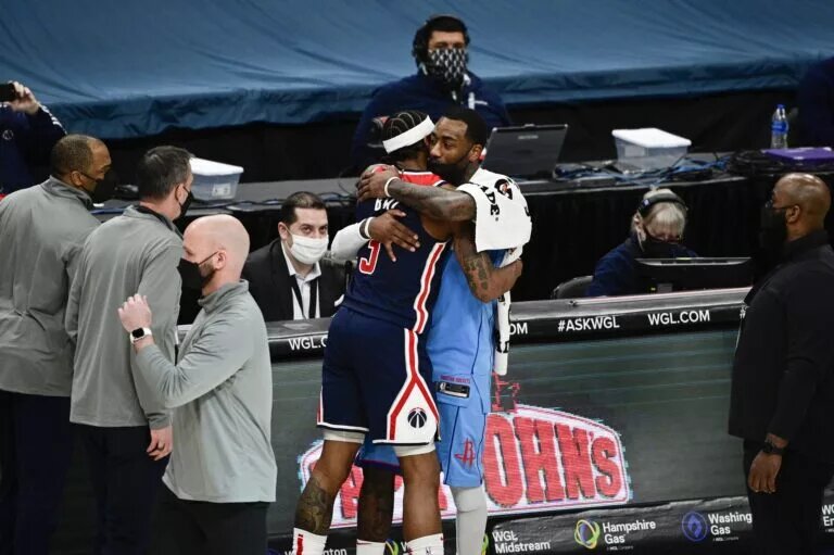 Washington Wizards guard Bradley Beal (3) and Houston Rockets guard John Wall (1)