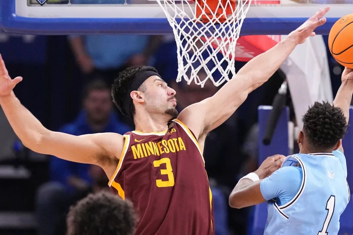 Minnesota Golden Gophers forward Dawson Garcia (3) attempts to block Indiana State Sycamores guard Julian Larry (1) on Sunday, March 24, 2024, during the second round of the NIT at the Hulman Center in Terre Haute. The Indiana State Sycamores defeated the Minnesota Golden Gophers, 76-64.