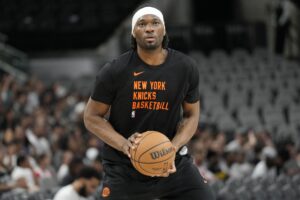 New York Knicks forward Precious Achiuwa (5) warms up before a game against the San Antonio Spurs at Frost Bank Center.