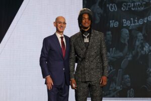 Jun 26, 2024; Brooklyn, NY, USA; Stephon Castle poses for photos with NBA commissioner Adam Silver after being selected in the first round by the San Antonio Spurs in the 2024 NBA Draft at Barclays Center. Mandatory Credit: Brad Penner-USA TODAY Sports