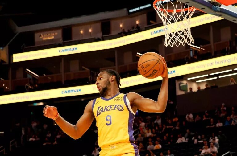 Jul 6, 2024; San Francisco, CA, USA; Los Angeles Lakers guard Bronny James Jr. (9) controls a rebound against the Sacramento Kings during the first quarter at Chase Center. Mandatory Credit: Kelley L Cox-USA TODAY Sports