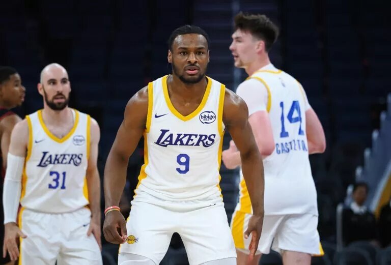 Jul 10, 2024; San Francisco, CA, USA; Los Angeles Lakers guard Bronny James Jr. (9) on defense against the Miami Heat during the fourth quarter at Chase Center. Mandatory Credit: Kelley L Cox-USA TODAY Sports