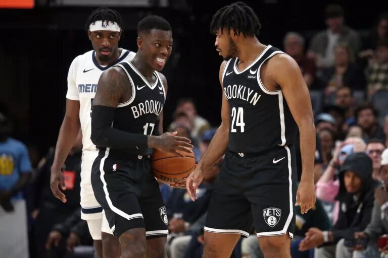 Brooklyn Nets guards Cam Thomas and Dennis Schroder