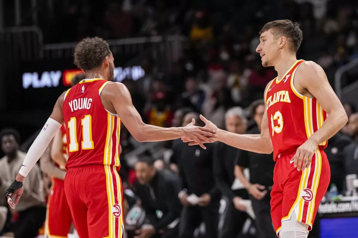 Atlanta Hawks guard Trae Young (11) and guard Bogdan Bogdanovic (13)