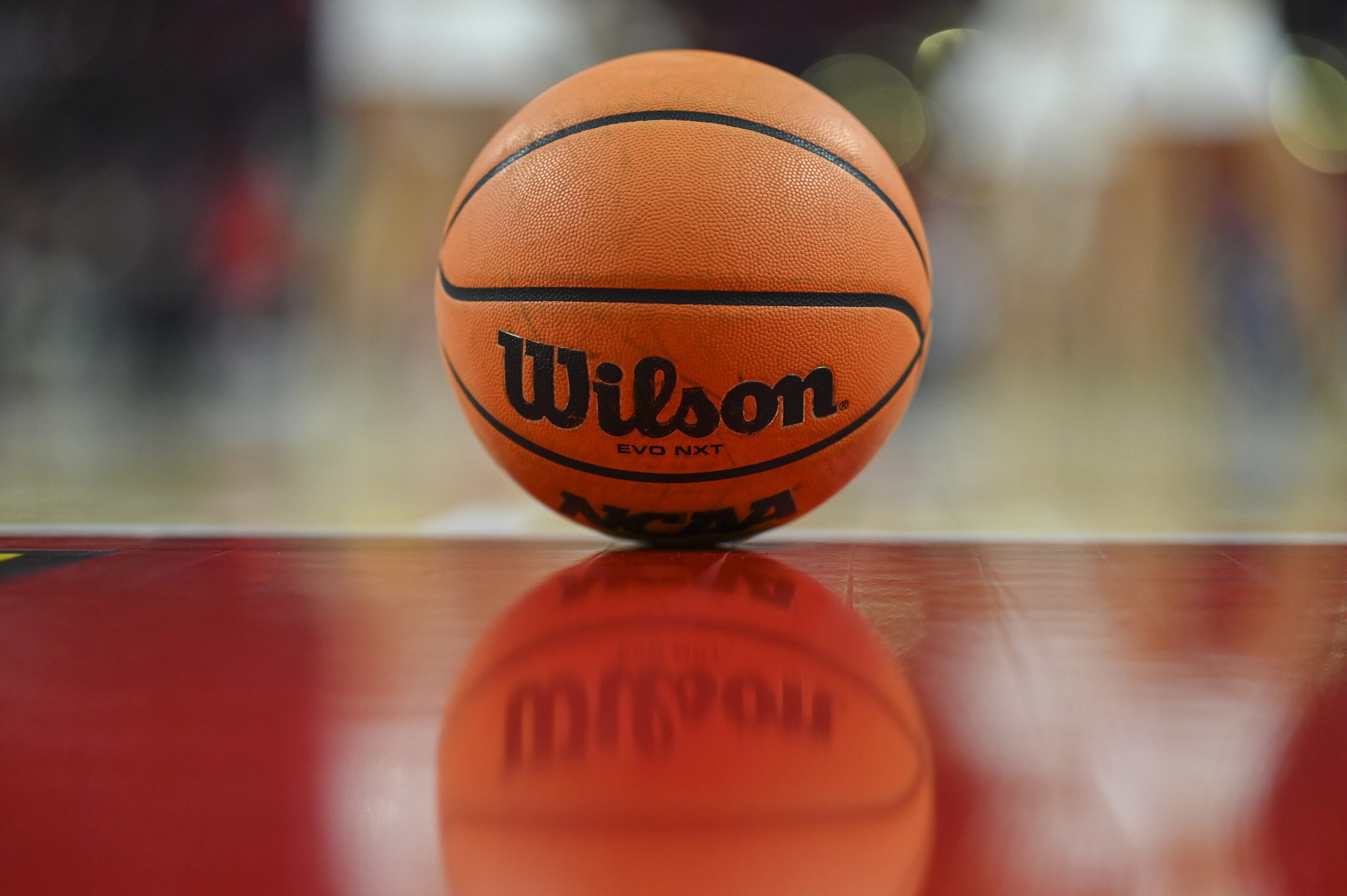 A detailed views of a game reflects off the court during the first half of the game between the Maryland Terrapins and the Michigan Wolverines at Xfinity Center.