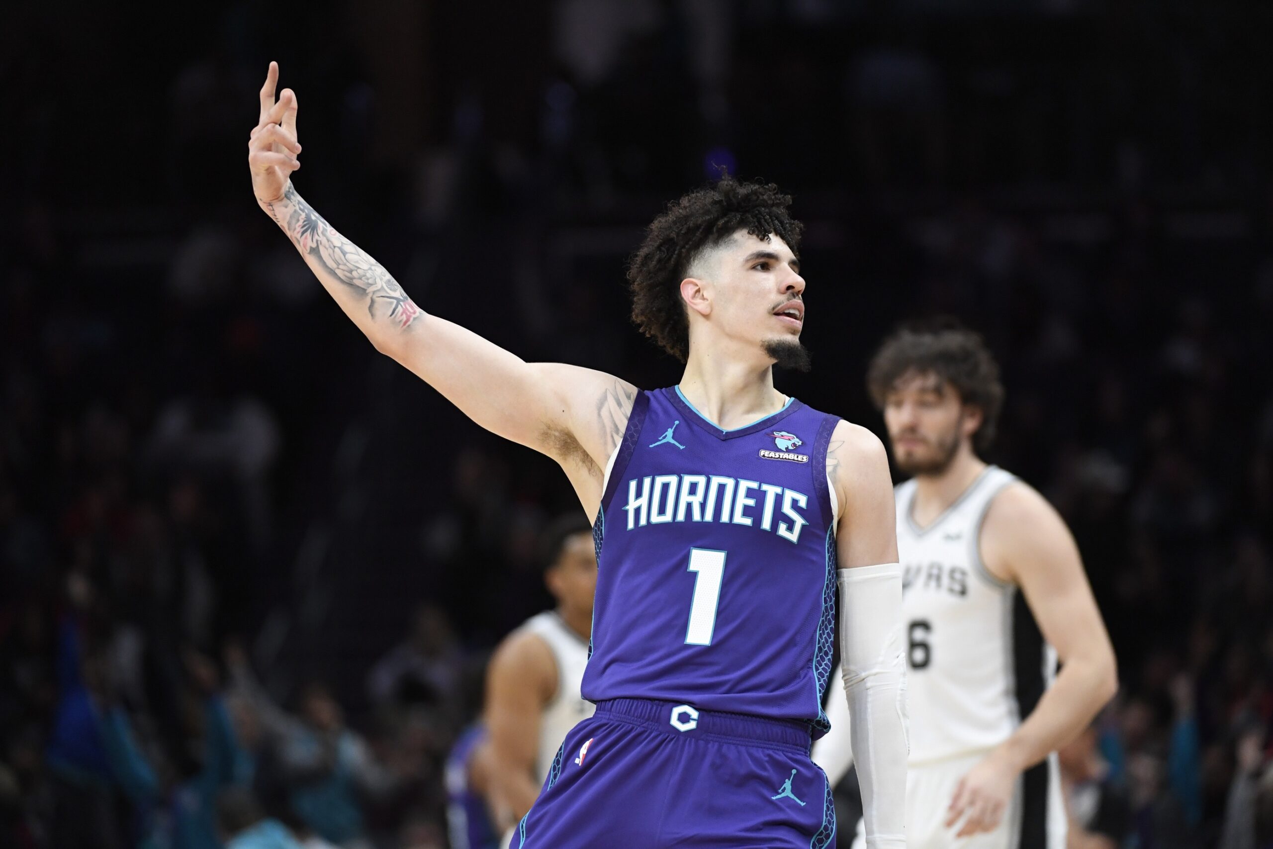 Charlotte Hornets guard LaMelo Ball (1) reacts after scoring during the second half against the San Antonio Spurs at the Spectrum Center.