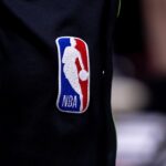 Detailed view go the NBA logo between the New Orleans Pelicans and the Oklahoma City Thunder r during the second half of game four of the first round for the 2024 NBA playoffs at Smoothie King Center.