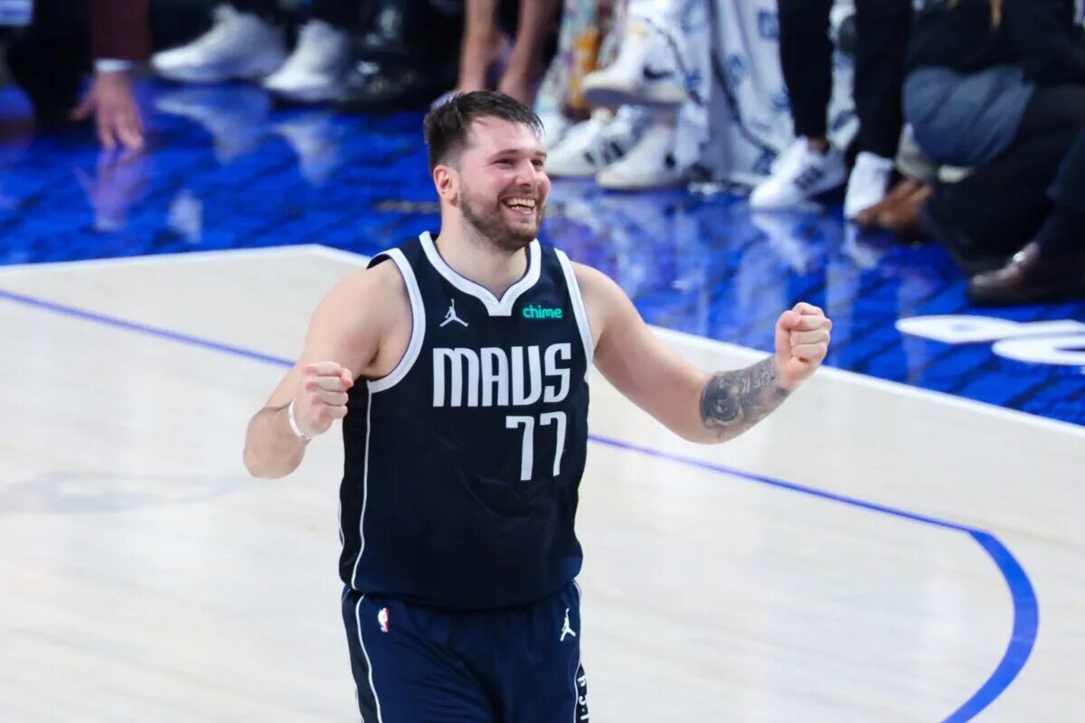Dallas Mavericks guard Luka Doncic (77) reacts during the game against the Boston Celtics during game four of the 2024 NBA Finals at American Airlines Center.