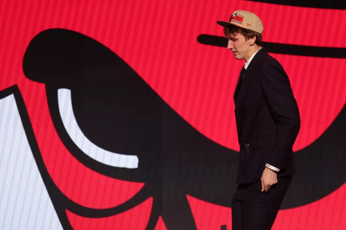 Jun 26, 2024; Brooklyn, NY, USA; Matas Buzelis walks on stage after being selected in the first round by the Chicago Bulls in the 2024 NBA Draft at Barclays Center. Mandatory Credit: Brad Penner-USA TODAY Sports