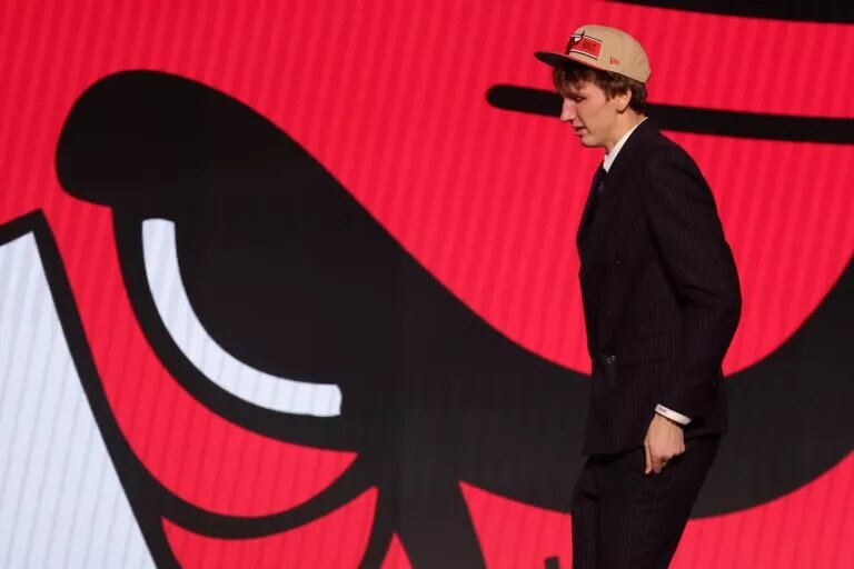Jun 26, 2024; Brooklyn, NY, USA; Matas Buzelis walks on stage after being selected in the first round by the Chicago Bulls in the 2024 NBA Draft at Barclays Center. Mandatory Credit: Brad Penner-USA TODAY Sports