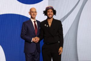 Jun 26, 2024; Brooklyn, NY, USA; Jared McCain poses for photos with NBA commissioner Adam Silver after being selected in the first round by the Philadelphia 76ers in the 2024 NBA Draft at Barclays Center. Mandatory Credit: Brad Penner-USA TODAY Sports