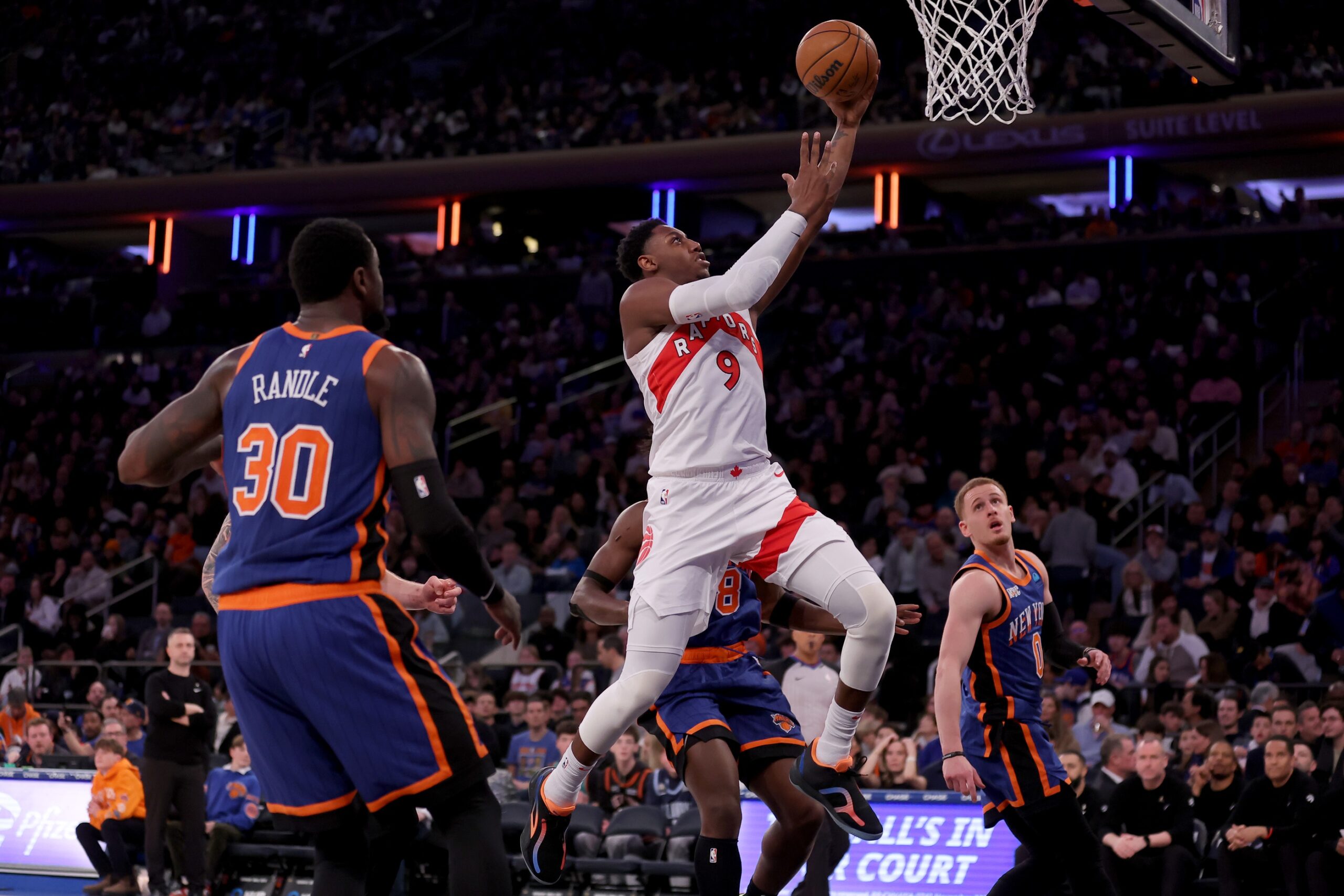 Toronto Raptors guard RJ Barrett (9) drives to the basket against New York Knicks