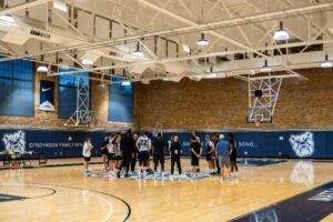 Butler Basketball men’s team huddles up after practice (Greg Oden story)