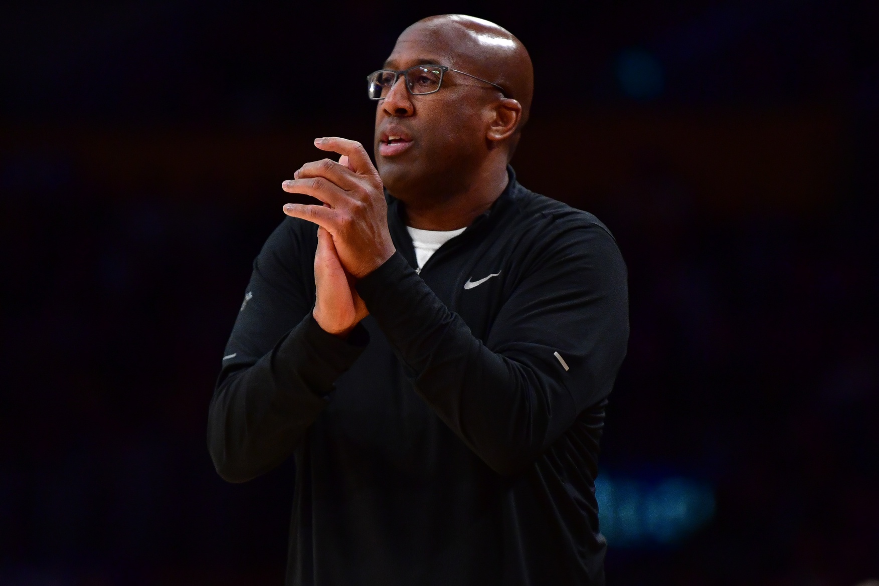 Sacramento Kings head coach Mike Brown watches game action