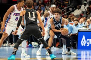 Atlanta Hawks forward Jalen Johnson (1) looks to Atlanta Hawks guard Trae Young