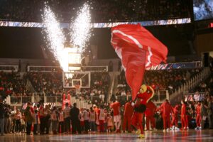 Atlanta Hawks mascot Harry Hawk waves a team flag on the court prior to the game