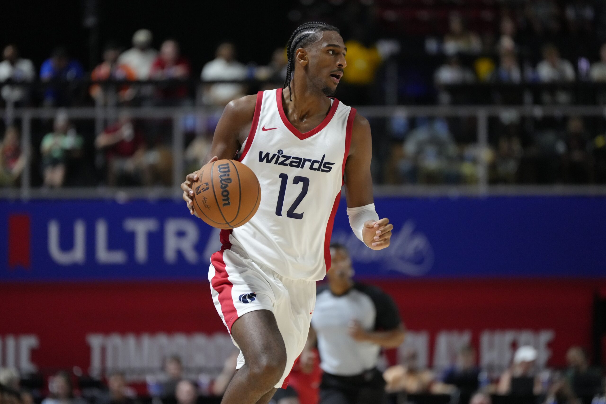 Washington Wizards top pick Alex Sarr (12) dribbles the ball